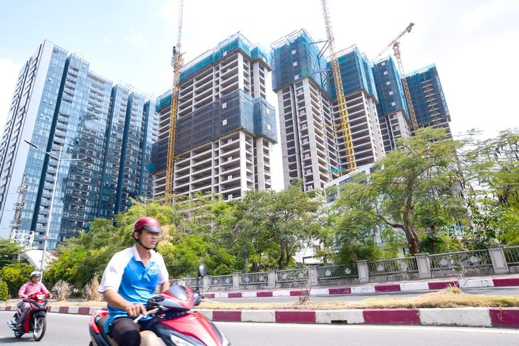 Dự án bất động sản đang được xây dựng ở quận 7, TP.HCM - Ảnh: QUANG ĐỊNH Dự án bất động sản đang được xây dựng ở quận 7, TP.HCM - Ảnh: QUANG ĐỊNH